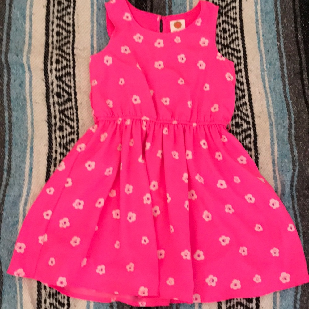 Kid’s pink and white flower dress.